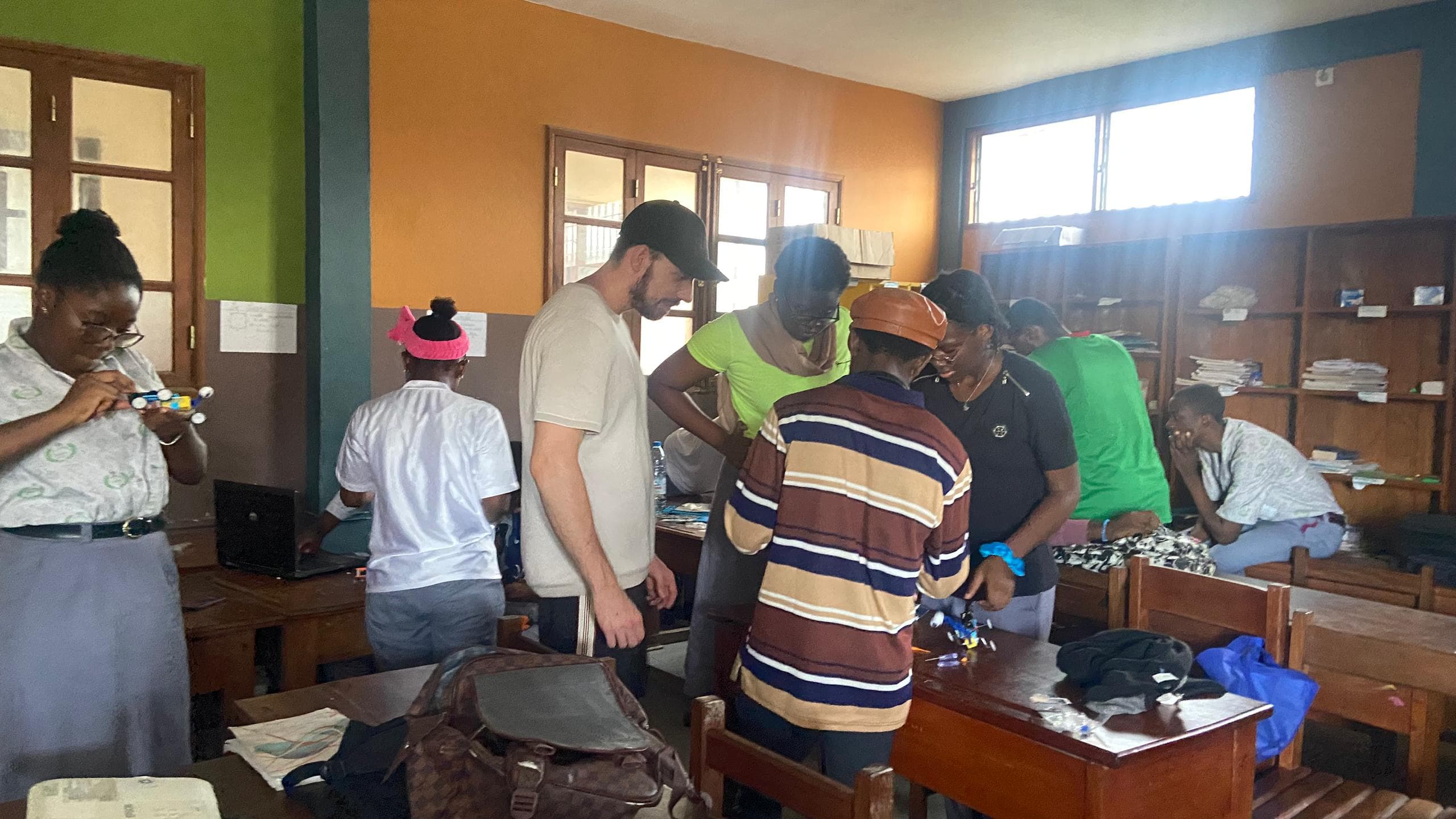 Giiyo Tech students and mentors working together on technology projects